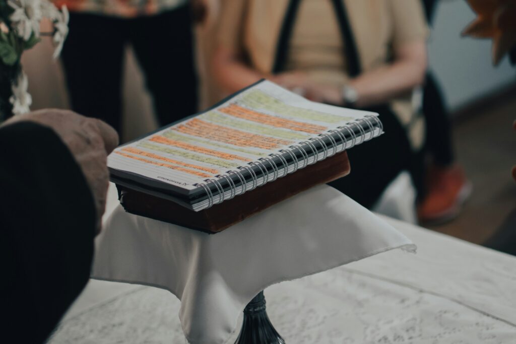 A photo by gaspar zaldo of a book with highlighted text on top of a lecturn